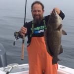 Capt. Tommy Butler with a Good Sized Gag Grouper From 2-1-14